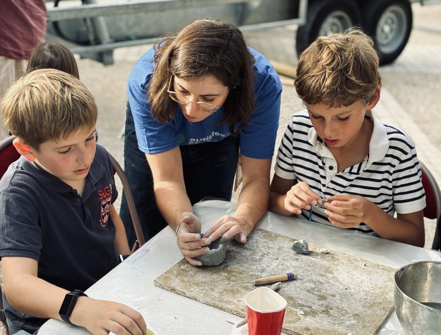 Atelier poterie avec une bénévole ASF 75